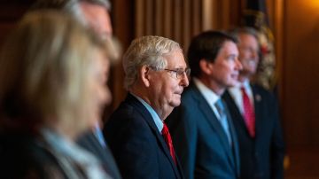 WASHINGTON, DC: U.S. Sen. Majority Leader Mitch McConnell (R-KY), poses with newly elected Republican Senators, left to right, Sen.-elect Cynthia Lummis, R-Wyo., Sen.-elect Tommy Tuberville, R-Ala., Sen.-elect Bill Hagerty, R-Tenn., and Sen.-elect Roger Marshall, R-Kan. on Capitol Hill November 9, 2020 in Washington, DC. The Senate is reconvening for the first time after the 2020 Presidential Election and a coronavirus relief package is high on their list of priorities.  ( Photo by Ken Cedeno-Pool/Getty Images)