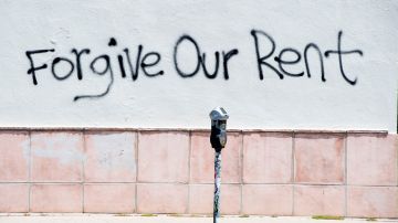 A graffiti asking for rent forgiveness is seen on a wall on La Brea Ave on National May Day amid the Covid-19 pandemic,  May 1, 2020, in Los Angeles, California. - Several cities and states, including California, have passed executive orders prohibiting eviction of tenants affected by the coronavirus crisis.
But when the lockdown lifts, the moratorium will end. And tenants will have to pay their back-rent or move out. (Photo by VALERIE MACON / AFP) (Photo by VALERIE MACON/AFP via Getty Images)