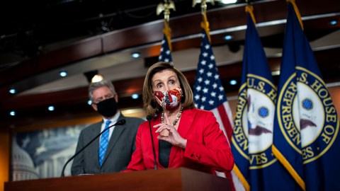 WASHINGTON, DC - NOVEMBER 06: Speaker of the House Nancy Pelosi (D-CA) talks to reporters as House Energy and Commerce Committee Chairman Frank Pallone (D-NJ), listens, during her weekly news conference in the House Visitors Center at the U.S. Capitol on November 6, 2020 in Washington, DC. The 2020 presidential race between incumbent U.S. President Donald Trump and Democratic nominee Joe Biden is still too close to call with outstanding ballots in a number of states including Georgia. (Photo by Al Drago/Getty Images)