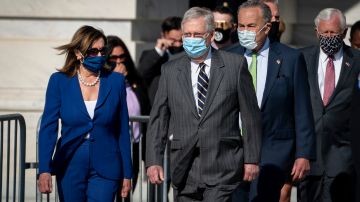 WASHINGTON, DC - JULY 29: (L-R) Speaker of the House Nancy Pelosi (D-CA), Senate Majority Leader Mitch McConnell (R-KY), Senate Minority Leader Chuck Schumer (D-NY) and Rep. Steny Hoyer (D-MD) walk outside before the casket of the late civil rights icon Rep. John Lewis (D-GA) departs the United States Capitol on July 29, 2020 in Washington, DC. After lying in state at the Capitol, the body of Lewis will go to Atlanta, Georgia where he will lie in repose at the State Capitol ahead of Thursday's funeral service. (Photo by Drew Angerer/Getty Images)