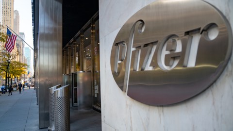 NEW YORK, NY - NOVEMBER 09: A sign for Pfizer is seen outside the Pfizer headquarters on November 9, 2020 in New York City. Pharmaceutical company Pfizer announced positive early results on its Covid-19 vaccine trial and has proven to be 90% effective in preventing infection of the virus. (Photo by David Dee Delgado/Getty Images)