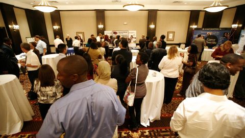 DALLAS - AUGUST 19: Job seekers wait to speak with recruiters at the Choice Career Fair on August 19, 2010 in Dallas, Texas. First-time jobless claims rose for the third week in a row, reaching the highest level in nine months. (Photo by Tom Pennington/Getty Images)
