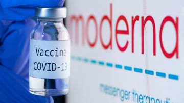This picture taken on November 18, 2020 shows a bottle reading "Vaccine Covid-19" next to the Moderna biotech company logo. - The CEO of Moderna warned European countries on November 17 that dragging out negotiations to purchase its promising new Covid-19 vaccine will slow down deliveries, as other nations that have signed deals will get priority. The biotech company Pfizer said the day after that a completed study of its experimental Covid-19 vaccine showed it is 95 percent effective, after Moderna said its own vaccine was 94.5 percent effective, according to a preliminary analysis. (Photo by JOEL SAGET / AFP) / -- IMAGE RESTRICTED TO EDITORIAL USE - STRICTLY NO COMMERCIAL USE -- (Photo by JOEL SAGET/AFP via Getty Images)