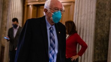 WASHINGTON, DC - DECEMBER 20: Sen. Bernie Sanders (I-VT) heads to the Senate floor at the US Capitol building on December 20, 2020 in Washington, DC. Republicans and Democrats in the Senate finally came to an agreement on the coronavirus relief bill and a vote is expected later today. (Photo by Samuel Corum/Getty Images)