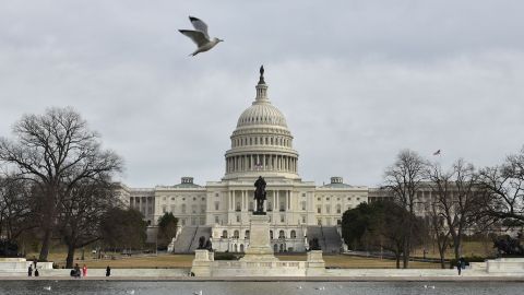 TOPSHOT - The US Capitol is seen in Washington, DC on January 22, 2018 after the US Senate reached a deal to reopen the federal government, with Democrats accepting a compromise spending bill. / AFP PHOTO / MANDEL NGAN        (Photo credit should read MANDEL NGAN/AFP via Getty Images)