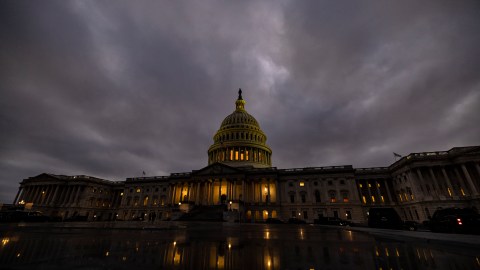 WASHINGTON, DC - DECEMBER 20: Dusk falls over the US Capitol building on December 20, 2020 in Washington, DC. Republicans and Democrats in the Senate finally came to an agreement on the coronavirus relief bill and a vote is expected later today or tomorrow. (Photo by Samuel Corum/Getty Images)