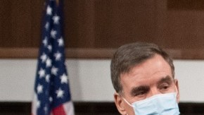 US Senator Joe Manchin (C), Democrat of West Virginia, speaks alongside a bipartisan group of Democrat and Republican members of Congress as they announce a proposal for a Covid-19 relief bill on Capitol Hill in Washington, DC, on December 1, 2020.