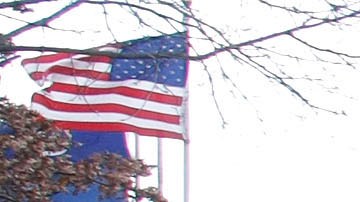 WAYNE, MI - MARCH 11:  People stand in freezing temperatures to attend a jobs fair at the City of Wayne Community Center March 11, 2009 in Wayne, Michigan. The fair was sponsored by "Michigan Works!" a workforce development association that fosters high-quality employment and training programs. Many of those in attendance have been retrained through the State of Michigan's "No Worker Left Behind" program.  (Photo by Bill Pugliano/Getty Images)