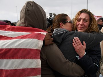 LORDSTOWN, OH - MARCH 06: GM Lordstown workers comfort one another after their last day of work at a rally outside the GM Lordstown plant on March 6, 2019 in Lordstown, Ohio. The sprawling facility was idled today after more than 50 years producing cars and other vehicles, falling victim to changing U.S. auto preferences, according to the company.  (Photo by Jeff Swensen/Getty Images)