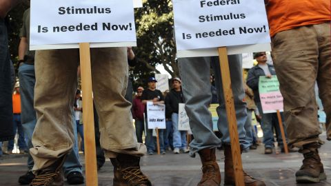 Union building trade workers attend a rally to call for the release of federal stimulus funds to save local jobs, on the steps of City Hall in Los Angeles April 14, 2010.  Many of the 500 plumbers, sheetmetal workers, electricials, steel workers and other tradesmen attending the rally are unemployed due to the slowdown in the economy.  AFP PHOTO / Robyn Beck (Photo credit should read ROBYN BECK/AFP via Getty Images)