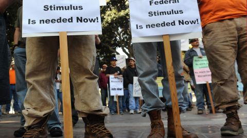 Union building trade workers attend a rally to call for the release of federal stimulus funds to save local jobs, on the steps of City Hall in Los Angeles April 14, 2010. Many of the 500 plumbers, sheetmetal workers, electricials, steel workers and other tradesmen attending the rally are unemployed due to the slowdown in the economy. AFP PHOTO / Robyn Beck (Photo credit should read ROBYN BECK/AFP via Getty Images)