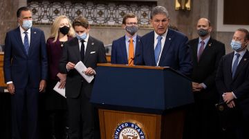 WASHINGTON, DC - DECEMBER 01: Sen. Joe Manchin (D-WV) speaks alongside a bipartisan group of Democrat and Republican members of Congress as they announce a proposal for a Covid-19 relief bill on Capitol Hill on December 01, 2020 in Washington, DC. The roughly $908 billion proposal includes $288 billion in small business aid such as Paycheck Protection Program loans, $160 billion in state and local government relief and $180 billion to fund a $300 per week supplemental unemployment benefit through March, according to a draft framework. (Photo by Tasos Katopodis/Getty Images)