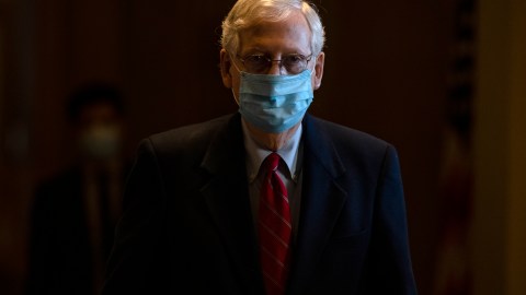 WASHINGTON, DC - NOVEMBER 09: Senate Majority Leader Mitch McConnell heads to the Senate floor to gavel the Senate into session on November 9, 2020 in Washington, DC. The Senate is reconvening for the first time after the 2020 Presidential Election and a coronavirus relief package is high on their list of priorities. (Photo by Samuel Corum/Getty Images)