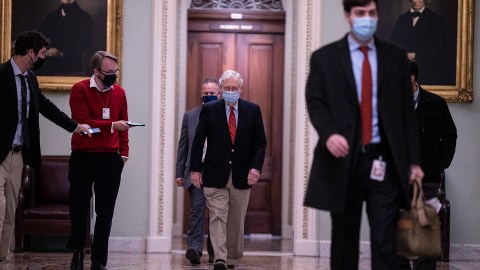 WASHINGTON, DC - DECEMBER 20: U.S. Senate Majority Leader Mitch McConnell (R-KY) arrives on Capitol Hill on December 20, 2020 in Washington, DC. Republicans and Democrats in the Senate finally came to an agreement on the coronavirus relief bill and a vote is expected later today. (Photo by Tasos Katopodis/Getty Images)