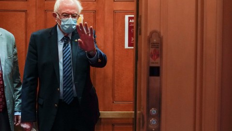 WASHINGTON, DC - DECEMBER 31: Senator Bernie Sanders (I-VT) walks from speaking as the Senate resumes debate on overriding the veto of the National Defense Authorization Act (NDAA) on Capitol Hill on December 31, 2020 in Washington, DC. Sanders is filibustering the NDAA, calling for a Senate vote on giving Americans $2,000 in direct payments for COVID-19 relief. (Photo by Joshua Roberts/Getty Images)