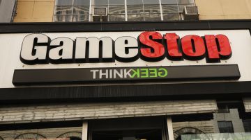 NEW YORK, NEW YORK - SEPTEMBER 16: People pass a GameStop store in lower Manhattan on September 16, 2019 in New York City. GameStop has announced that they will be closing between 180 and 200 stores before the end of the fiscal year due to a drop in sales. (Photo by Spencer Platt/Getty Images)