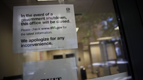 NEW YORK, NY - OCTOBER 01: A sign is posted in the window of an IRS office in Brooklyn notifying that the office is closed due to the government shutdown on October 1, 2013 in New York City. Federal museums and parks across the nation are closed starting today due to a government shutdown for the first time in nearly two decades. The Dow Jones industrial average, the S&P 500 and the Nasdaq all rose slightly higher in early trading Tuesday morning. (Photo by Spencer Platt/Getty Images)