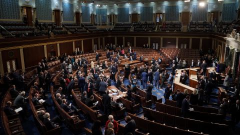 WASHINGTON, DC - JANUARY 06: Senators and Senate clerks leave to debate the certification of Arizona's Electoral College votes from the 2020 presidential election during a joint session of Congress on January 6, 2021 in Washington, DC. Congress held a joint session today to ratify President-elect Joe Biden’s 306-232 Electoral College win over President Donald Trump. A group of Republican senators said they would reject the Electoral College votes of several states unless Congress appointed a commission to audit the election results. (Photo by Greg Nash-Pool/Getty Images)