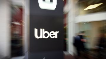 In this pan zoom image, an Uber logo is seen outside the company's headquarters in San Francisco, California on May 8, 2019. - One of the early promises of the ride-hailing era ushered in by Uber and Lyft was that the new entrants would complement public transit, reduce car ownership and help alleviate congestion. But a new study on San Francisco has found the opposite may be in fact be true: far from reducing traffic, the companies increased delays by 40 percent as commuters ditched buses or walking for mobile-app summoned rides. (Photo by Josh Edelson / AFP)        (Photo credit should read JOSH EDELSON/AFP via Getty Images)