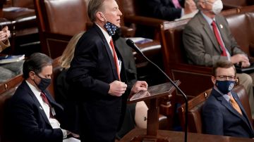 US Representative Paul Gosar, Republican of Arizona, objects to Arizona's Electoral College certification from the 2020 presidential election during a joint session of Congress on January 6, 2021. - Congress is meeting to certify Joe Biden as the winner of the 2020 presidential election, with scores of Republican lawmakers preparing to challenge the tally in a number of states during what is normally a largely ceremonial event. (Photo by Greg Nash / POOL / AFP) (Photo by GREG NASH/POOL/AFP via Getty Images)