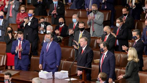 WASHINGTON, DC - JANUARY 06: Rep. Paul Gosar (R-AZ) (3rd R) and Sen. Ted Cruz (R-TX) (2nd L) are applauded by Republican members of Congress after they objected to the certification of the electoral votes for the state of Arizona during a Joint Session of Congress on January 06, 2021 in Washington, DC. Congress held a joint session today to ratify President-elect Joe Biden's 306-232 Electoral College win over President Donald Trump. A group of Republican senators said they would reject the Electoral College votes of several states unless Congress appointed a commission to audit the election results. (Photo by Win McNamee/Getty Images)