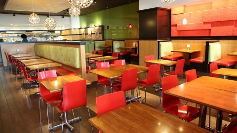 SEATTLE, WA - MARCH 16: The Veggie Grill restaurant is empty on March 16, 2020 in downtown Seattle, Washington. Today, Washington state Governor Jay Inslee ordered all bars, restaurants, entertainment and recreation facilities to temporarily close to fight the spread of COVID-19 in the state with by far the most deaths in the U.S. from the coronavirus disease. Their owner requires employees to wash their hands every 20 minutes and every time they touch something they have to change their gloves. No dining is allowed inside and today is the last day customers can still come into the restaurant and pick up their meal. Starting tomorrow the employees will have to deliver the order out the front door. (Photo by Karen Ducey/Getty Images)