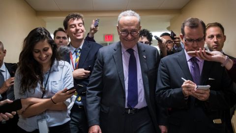 WASHINGTON, DC - OCTOBER 19: Senate Minority Leader Chuck Schumer (D-NY) talks to reporters as he heads to a vote on amendments to the fiscal year 2018 budget resolution, on Capitol Hill, October 19, 2017 in Washington, DC. Thursday afternoon, the Senate kicked off a 'vote-a-rama;' a marathon voting session for amendments to the budget resolution. (Photo by Drew Angerer/Getty Images)