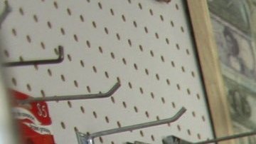 FARMERS BRANCH, TX - NOVEMBER 13:  Samuel Rodriguez, originally from El Salvador, works in the Hispanic oriented store Tienda Santa Rosa November 13, 2006 in Farmers Branch, Texas. He said he hoped that the proposed anti-immigration legislation proposed by the city council there will not pass because it would be bad for the community and bad for business. Later in the evening, council members unanimously voted to pass the legislation that would make English the official language of the city and approving fines for landlords and businesses who do business with illegal immigrants. (Photo by Brian Harkin/Getty Images)