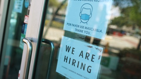 MIAMI, FLORIDA - MARCH 05: A 'we are hiring' sign in front of a store on March 05, 2021 in Miami, Florida. The restaurant is looking to hire more workers as the U.S. unemployment rate drops to 6.2 percent, as many restaurants and bars reopen. Officials credit the job growth to declining new COVID-19 cases and broadening vaccine immunization that has helped more businesses reopen with greater capacity. (Photo by Joe Raedle/Getty Images)
