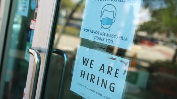 MIAMI, FLORIDA - MARCH 05: A 'we are hiring' sign in front of a store on March 05, 2021 in Miami, Florida. The restaurant is looking to hire more workers as the U.S. unemployment rate drops to 6.2 percent, as many restaurants and bars reopen. Officials credit the job growth to declining new COVID-19 cases and broadening vaccine immunization that has helped more businesses reopen with greater capacity. (Photo by Joe Raedle/Getty Images)