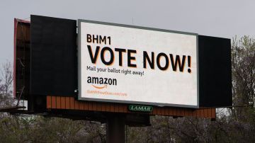 BESSEMER, AL - MARCH 28: An Amazon-sponsored billboard urging employees to return their unionization ballots is seen on March 28, 2021 in Bessemer, Alabama. Employees at the Amazon fulfillment center in Bessemer are currently voting on whether to form a union, a decision that could have national repercussions. (Photo by Elijah Nouvelage/Getty Images)