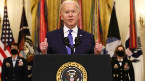 WASHINGTON, DC - MARCH 08: U.S. President Joe Biden delivers remarks on International Women’s Day as Air Force General Jacqueline Van Ovost (L) and Army Lieutenant General Laura Richardson (R) listen during an announcement at the East Room of the White House March 8, 2021 in Washington, DC. President Biden announced the nominations of General Van Ovost and Lieutenant General Richardson to positions as 4-star combatant commanders. They will become the second and the third women to lead a combatant command in American history. (Photo by Alex Wong/Getty Images)