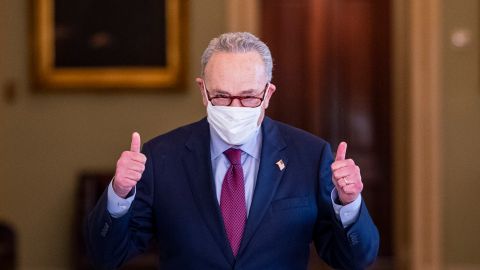 WASHINGTON, DC - MARCH 06: U.S. Senate Majority Leader Sen. Chuck Schumer (D-NY) gives a thumbs up after leaving the senate chamber at the US Captiol on March 06, 2021 in Washington, DC. The Senate passed the latest COVID-19 relief bill by 50 to 49 on a party line vote, after a all night session.  (Photo by Tasos Katopodis/Getty Images)