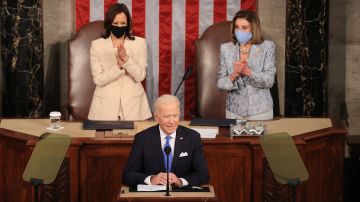 WASHINGTON, DC - APRIL 28: U.S. President Joe Biden addresses a joint session of congress as Vice President Kamala Harris (L) and Speaker of the House U.S. Rep. Nancy Pelosi (D-CA) (R) look on in the House chamber of the U.S. Capitol April 28, 2021 in Washington, DC. On the eve of his 100th day in office, Biden spoke about his plan to revive America’s economy and health as it continues to recover from a devastating pandemic. He delivered his speech before 200 invited lawmakers and other government officials instead of the normal 1600 guests because of the ongoing COVID-19 pandemic. (Photo by Chip Somodevilla/Getty Images)