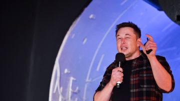 Elon Musk, co-founder and chief executive officer of Tesla Inc., speaks during an unveiling event for the Boring Company Hawthorne test tunnel in Hawthorne, south of Los Angeles, California on December 18, 2018. - Musk explained that the snail moves 14 times faster than a tunnel-digging machine. 
On Tuesday night December 18, 2018, Boring Co. officially opened the Hawthorne tunnel, a preview of Elon Musk's larger vision to ease L.A. traffic. (Photo by Robyn Beck / POOL / AFP)        (Photo credit should read ROBYN BECK/AFP via Getty Images)
