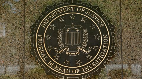 The FBI seal is seen outside the headquarters building in Washington, DC on July 5, 2016. - The FBI said Tuesday it will not recommend charges over Hillary Clinton's use of a private email server as secretary of state, but said she had been "extremely careless" in her handling of top secret data. The decision not to recommend prosecution will come as a huge relief for the presumptive Democratic nominee whose White House campaign has been dogged by the months-long probe. (Photo by YURI GRIPAS / AFP) (Photo credit should read YURI GRIPAS/AFP via Getty Images)