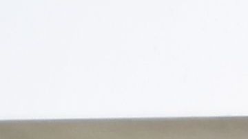 People walk past a sign reminding shoppers of the mask requirement while entering the Westfield Santa Anita shopping  mall on June 12, 2020 in Arcadia, California, as Phase 3 in Los Angeles County's battle with the coronavirus pandemic is underway with businesses reopening. (Photo by Frederic J. BROWN / AFP) (Photo by FREDERIC J. BROWN/AFP via Getty Images)