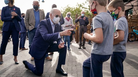DULUTH, MN - SEPTEMBER 18: Democratic presidential nominee and former Vice President Joe Biden greets young children outside of Amazing Grace coffee shop on September 18, 2020 in Duluth, Minnesota. (Photo by Drew Angerer/Getty Images)