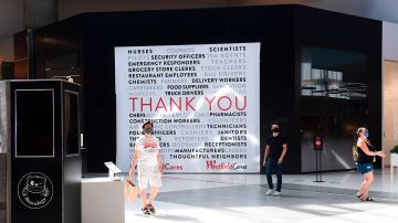 A thank you note to all workers is displayed inside the Westfield Santa Anita shopping mall in Arcadia, California on October 7, 2020, on the first day LA County shopping malls have been allowed to reopen, at 25% maximum capacity, after months of closure due to the coronavirus pandemic. (Photo by Frederic J. BROWN / AFP) (Photo by FREDERIC J. BROWN/AFP via Getty Images)