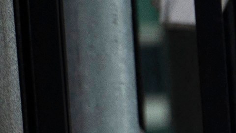 A woman wearing a facemask walks past a sign displaying Covid-19 safety requirements outside the United Nations in New York on March 11, 2021. - The virus has now killed more than 2.6 million people, subjected billions to anti-Covid restrictions, and left the global economy in tatters -- an outcome unimaginable at the outset of the crisis. (Photo by Kena Betancur / AFP) (Photo by KENA BETANCUR/AFP via Getty Images)
