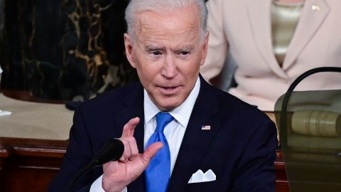 WASHINGTON, DC - APRIL 28: U.S. President Joe Biden addresses a joint session of congress in the House chamber of the U.S. Capitol on April 28, 2021 in Washington, DC. On the eve of his 100th day in office, Biden was to speak about his plan to revive America's economy and health as it continues to recover from a devastating pandemic. He was scheduled to deliver his speech before 200 invited lawmakers and other government officials instead of the normal 1600 guests because of the ongoing COVID-19 pandemic. (Photo by Jim Watson - POOL/Getty Images)