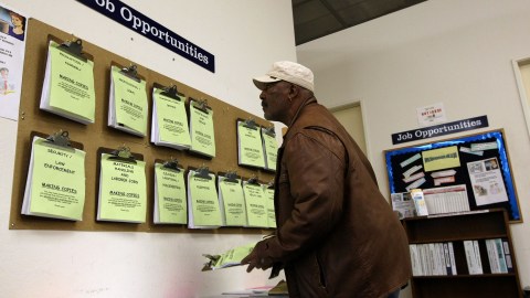 OAKLAND, CA - APRIL 17: Job Seeker Kenneth Massingale looks at job listings posted at the East Bay Works One-Stop Career Center April 17, 2009 in Oakland, California. The California state unemployment rate surged to 11.2 percent in March, the highest level since 1941 when unemployment was 11.7 percent. An estimated 2.1 million Californians are out of work. .(Photo by Justin Sullivan/Getty Images)