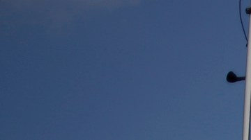PLEASUREVILLE, KY - SEPTEMBER 9:  Vehicles driven by migrant workers from Mexico and Nicaragua are seen parked outside a tobacco barn September 9, 2013 in Pleasureville, Kentucky. The migrant workers participate in the U.S. Department of Labor's H-2A temporary agricultural program, which allows agricultural employers to hire temporary help for seasonal work. (Photo by Luke Sharrett/Getty Images)