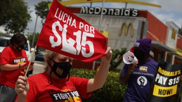 FORT LAUDERDALE, FLORIDA - MAY 19: Laura Hill joins with McDonald's workers and labor activists to protest against the restaurant chain on May 19, 2021 in Fort Lauderdale, Florida. McDonald's workers in 15 cities across the country held the protests on the day before the company's annual shareholder meeting to demand McDonald's pay at least $15/hr. (Photo by Joe Raedle/Getty Images)