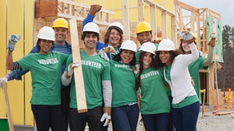 Volunteers working on construction site