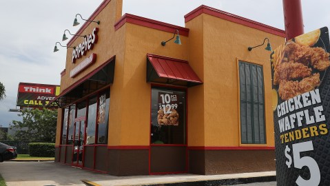 MIAMI, FL - FEBRUARY 21: A Popeyes restaurant is seen on February 21, 2017 in Miami, Florida. Burger King and Tim Horton's owner Restaurant Brands International has announced plans on buying Popeyes Louisiana Kitchen in a deal valued at $1.8 billion. (Photo by Joe Raedle/Getty Images)