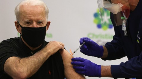 WILMINGTON, DELAWARE - JANUARY 11: President-elect Joe Biden receives the second dose of the Pfizer/BioNTech COVID-19 vaccination from Chief Nurse Executive Ric Cuming at ChristianaCare Christiana Hospital on January 11, 2021 in Newark, Delaware. Biden received the second dose of the coronavirus vaccine three weeks after his first dose, received a few days before Christmas. (Photo by Alex Wong/Getty Images)