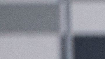 An Amazon employee walks by an Amazon Prime delivery truck in the company's premises in Brandizzo, near Turin, March 22, 2021. - 9,500 warehouse workers and 15,000 drivers of Amazon are on strike for the first time in Italy to claim better working conditions. (Photo by Marco Bertorello / AFP) (Photo by MARCO BERTORELLO/AFP via Getty Images)