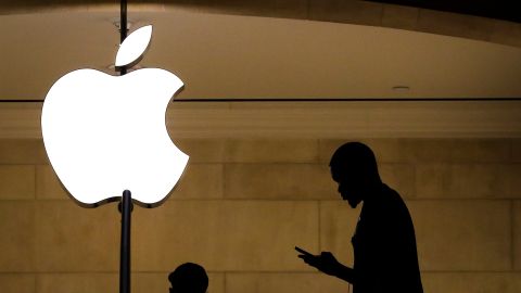 NEW YORK, NY - JANUARY 29: A man checks his phone in an Apple retail store in Grand Central Terminal, January 29, 2019 in New York City. Apple is set to report first-quarter earnings results after U.S. markets close on Tuesday. (Photo by Drew Angerer/Getty Images)