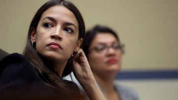 WASHINGTON, DC - JULY 18:  Rep. Alexandria Ocasio-Cortez (L) (D-NY) and Rep. Rashida Tlaib (D-MI) listen to testimony from acting Homeland Security Secretary Kevin McAleenan while he testifies before the House Oversight and Reform Committee on July 18, 2019 in Washington, DC. The hearing is on "The Trump Administration's Child Separation Policy."  (Photo by Win McNamee/Getty Images)